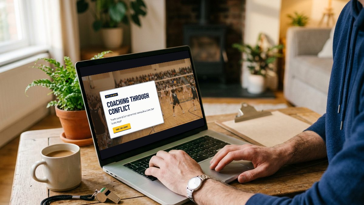A coach at home using the Coaching Through Conflict module on a laptop