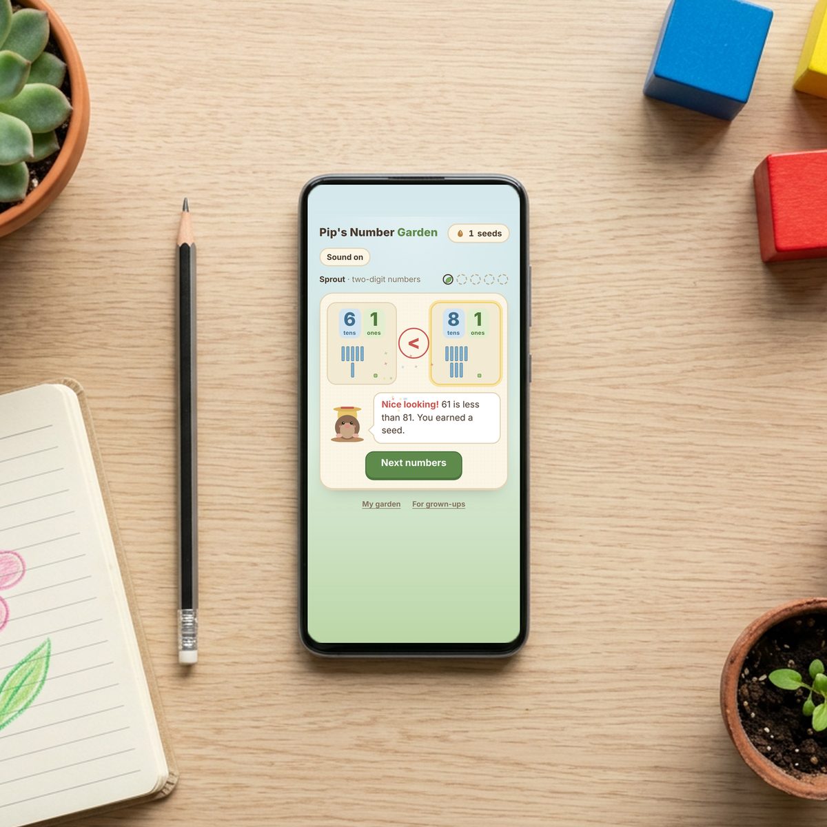Pip's Number Garden on a phone on a wooden table